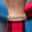 Load image into Gallery viewer, 10mm Heart Clustered Tennis Bracelet in Yellow Gold